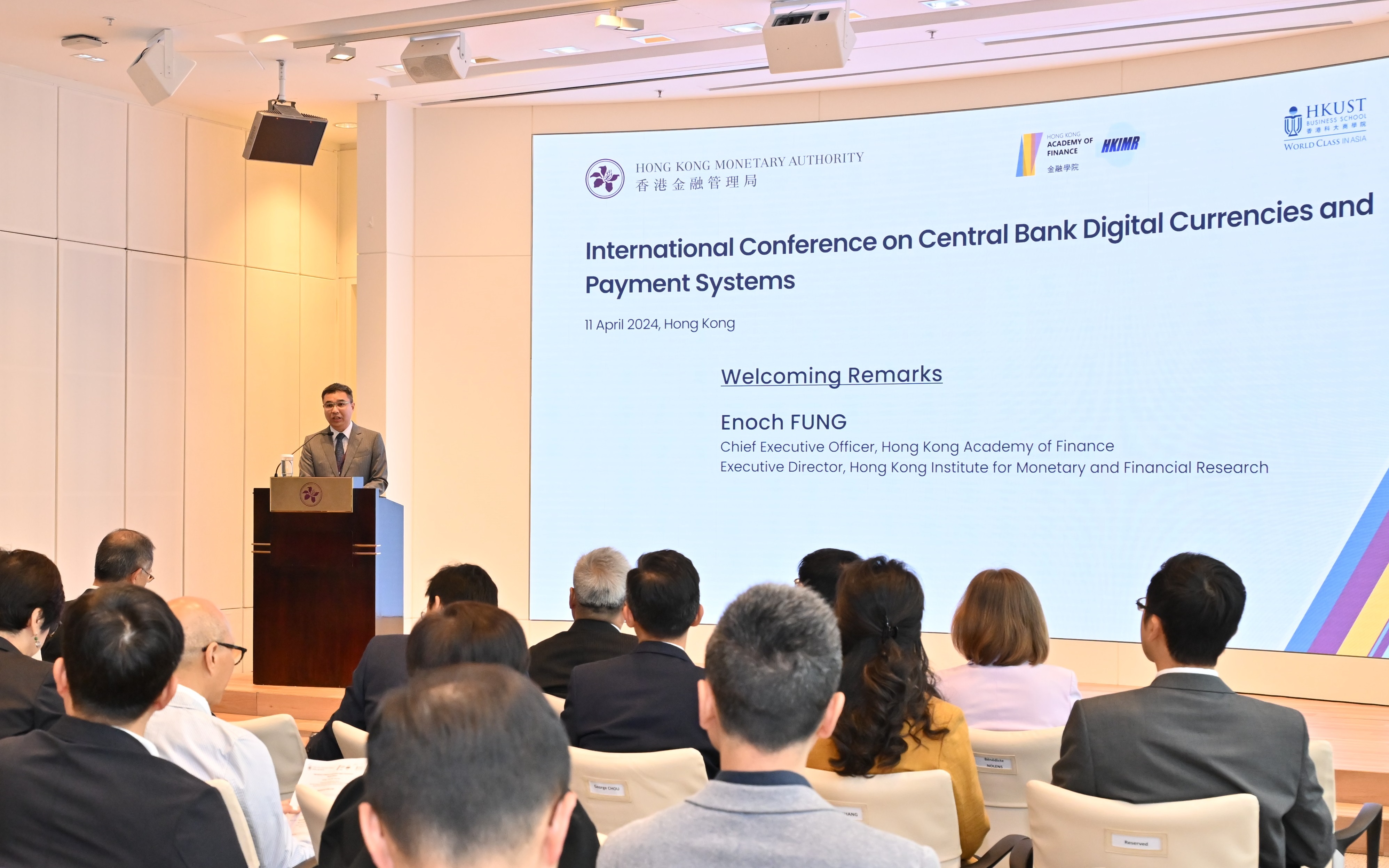 Mr. Enoch FUNG, CEO of the Hong Kong Academy of Finance and Executive Director of HKIMR, delivers the welcoming remarks at the conference.