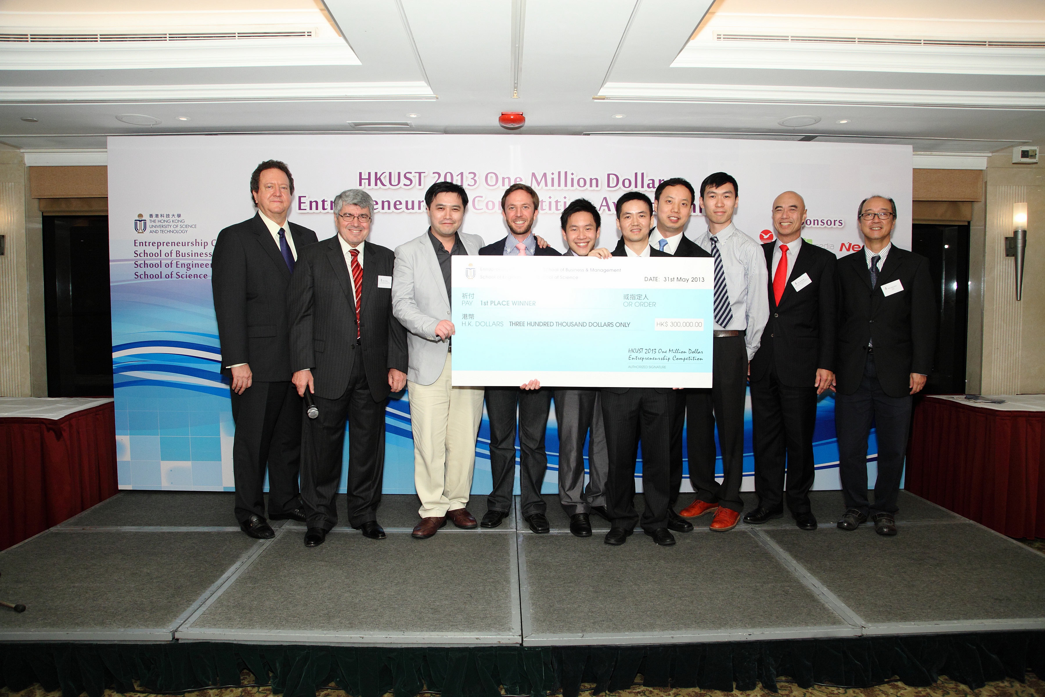 President Tony F Chan (right) presents award to Solaris, the champion of the annual HKUST One Million Dollar Entrepreneurship Competition. On the second left is Prof Ali Beba, Chair of the Competition and Director of the Entrepreneurship Center.