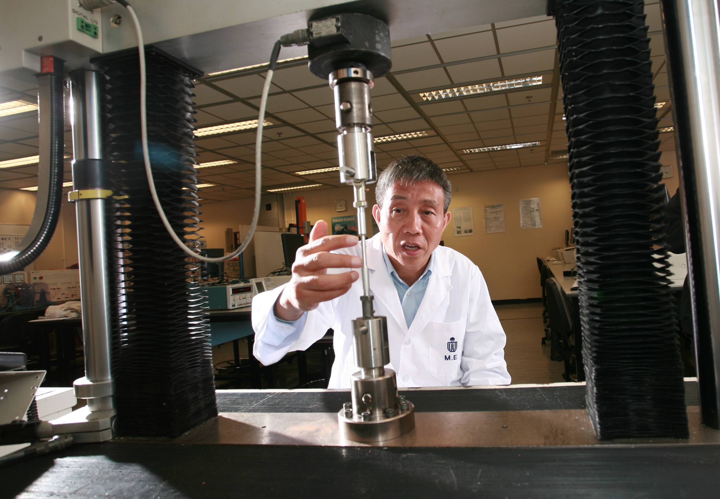 Prof Zhang Tongyi in his research laboratory at HKUST	