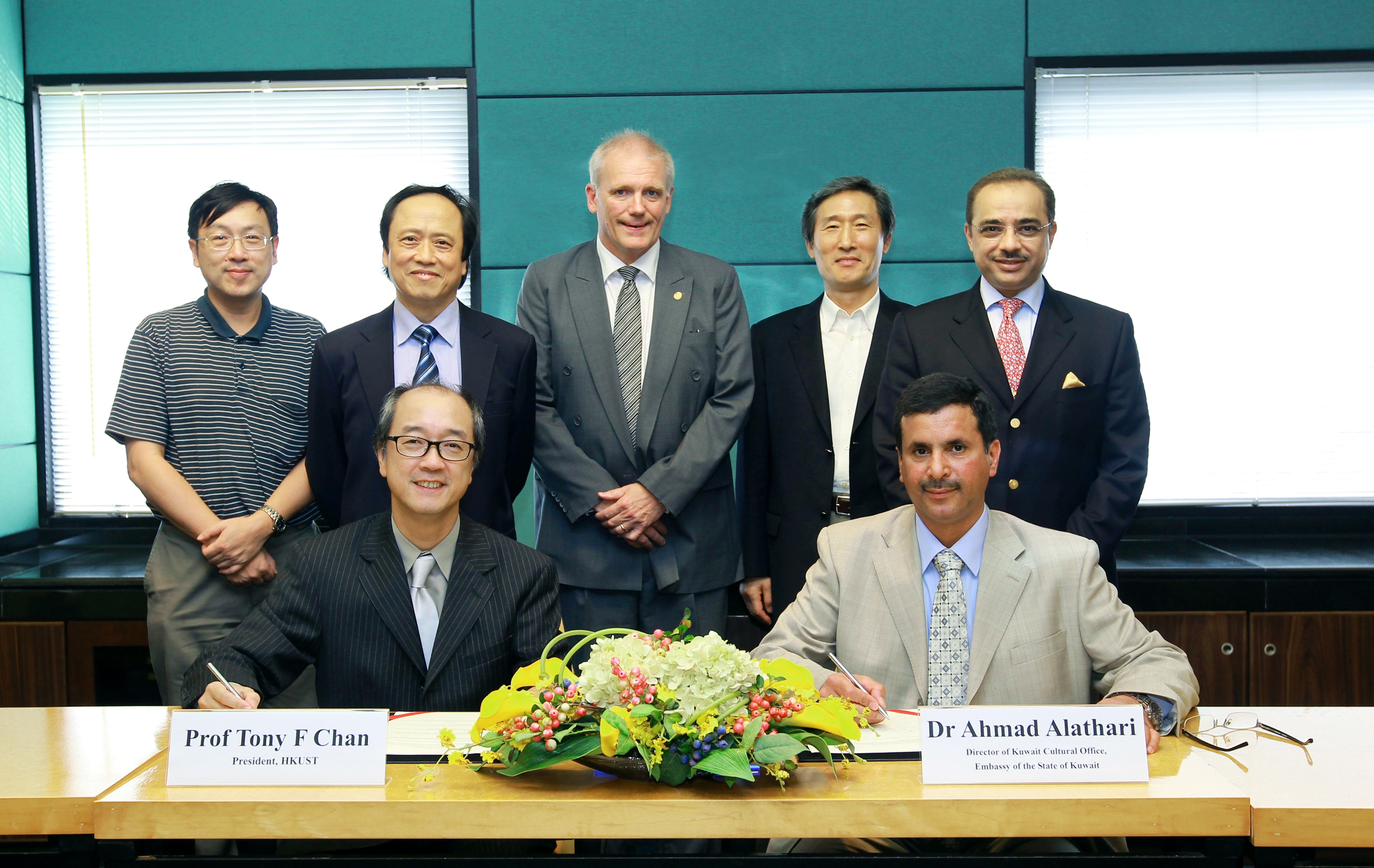 HKUST signs an MOU with Ministry of Higher Education in Kuwait: (front from left) HKUST President Tony F Chan and Dr Ahmad Alathari, Director of Kuwait Cultural Office, Embassy of the State of Kuwait, (back from left) HKUST Associate Dean of Science Prof Tai-Kai Ng; Acting Vice-President for Academic Affairs Prof Shiu-Yuen Cheng; Senior Associate Dean of Business and Management Prof Steve DeKrey; Associate Dean of Engineering Prof Jang Kyo Kim; and Consul General of the State of Kuwait, His Excellency Bader