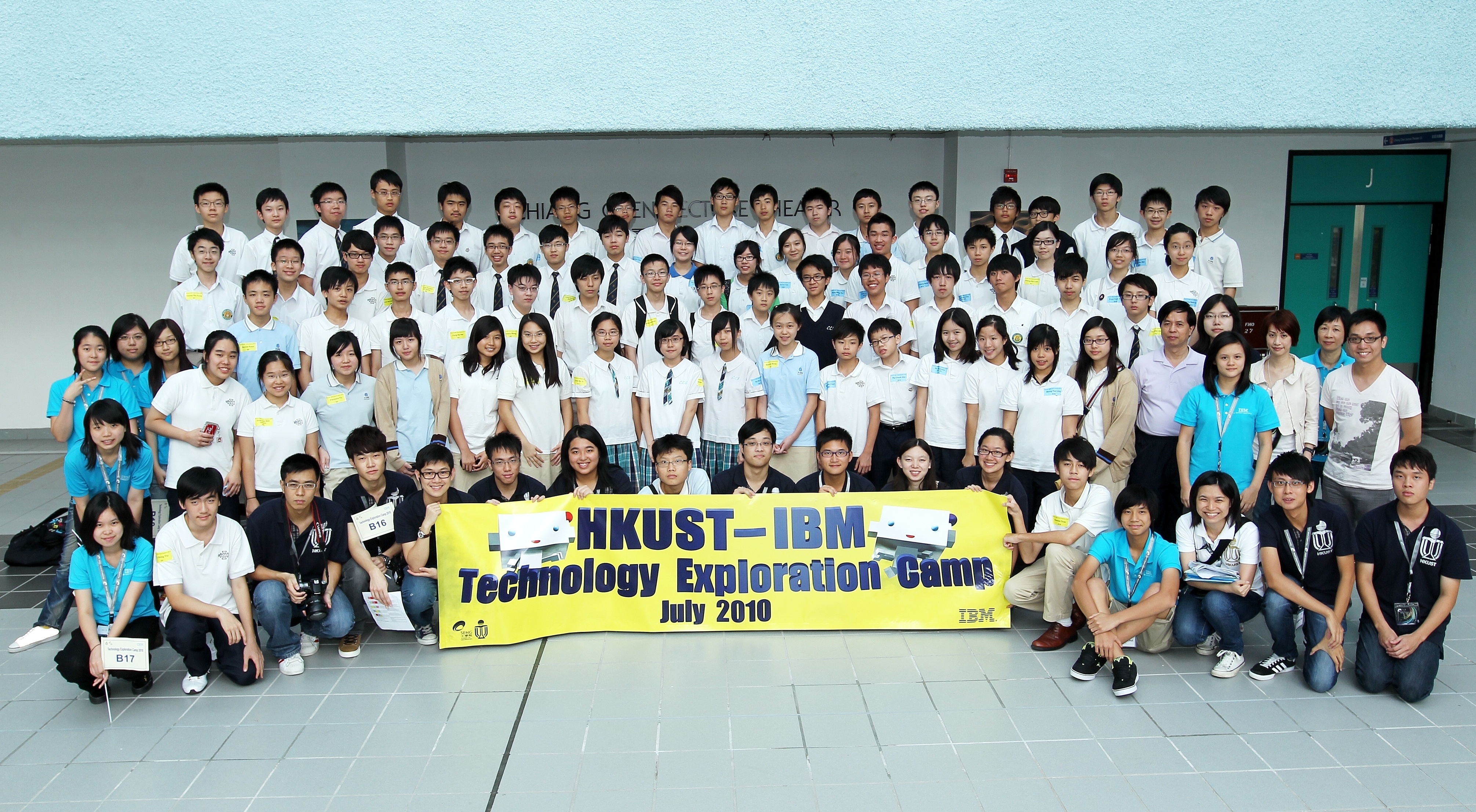 Students pose with the organizers as the day camp concludes.	